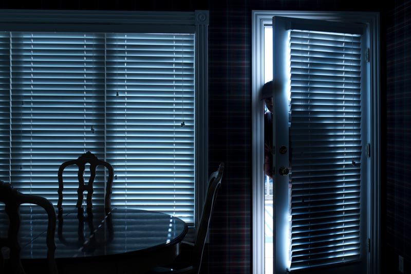 man breaking into home